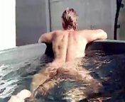 Bathing a cheerful housewife Lukerya in a mini pool naked under bright sunlight from pool naked