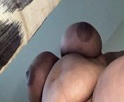 Solo ebony BBW with huge saggy natural tits masturbates with dildo from saggy natural tits