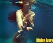 Kittina Ivory undresses in the swimming pool from sex in swimming pool