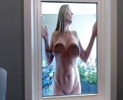 Here it is smushing my all natural 36DD's into the window. from red windo