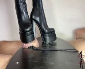 Mistress Elle in black large heels boots trample her slave cock on from platform high heelstrampling