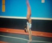 RedBone Ebony doing backflips in string blue thongs from bethany g gymnastic