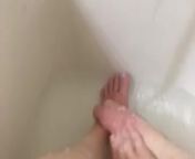 Girl washing sore feet and ankles after working long shift from soreh