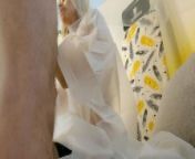 College girl gives a handjob with balls massage and playing teasing the big cock in a raincoat under an umbrella from cfnm massage